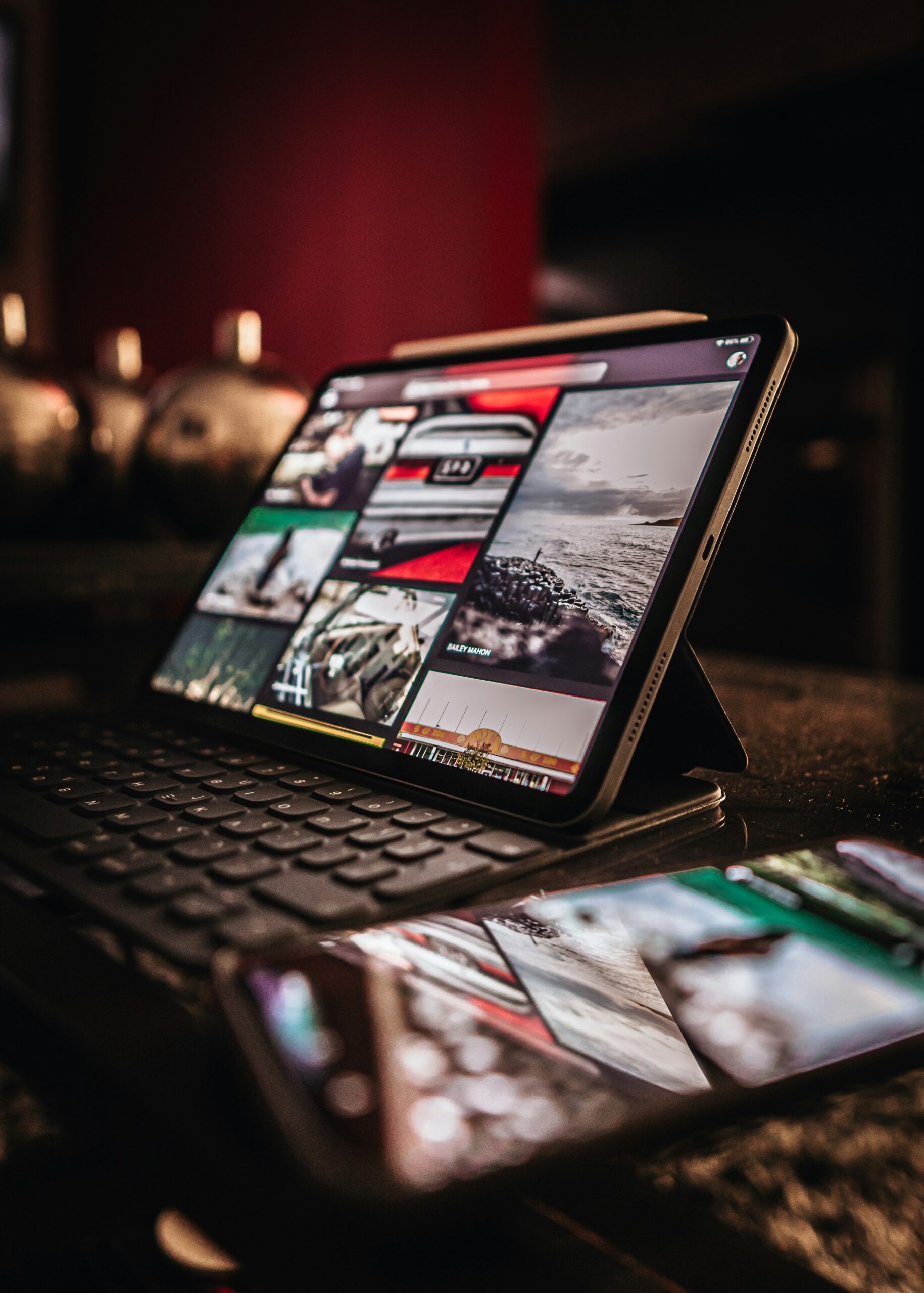 mobile app development services for iOS and Android - Tablet with app screens and phone reflection on desk — symbolizing multi-platform app development and collaboration.